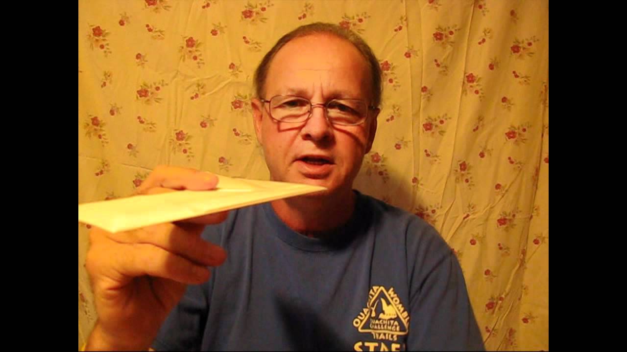 Mike holding an Advanced OmniWing up to the camera while explaining its aerodynamics